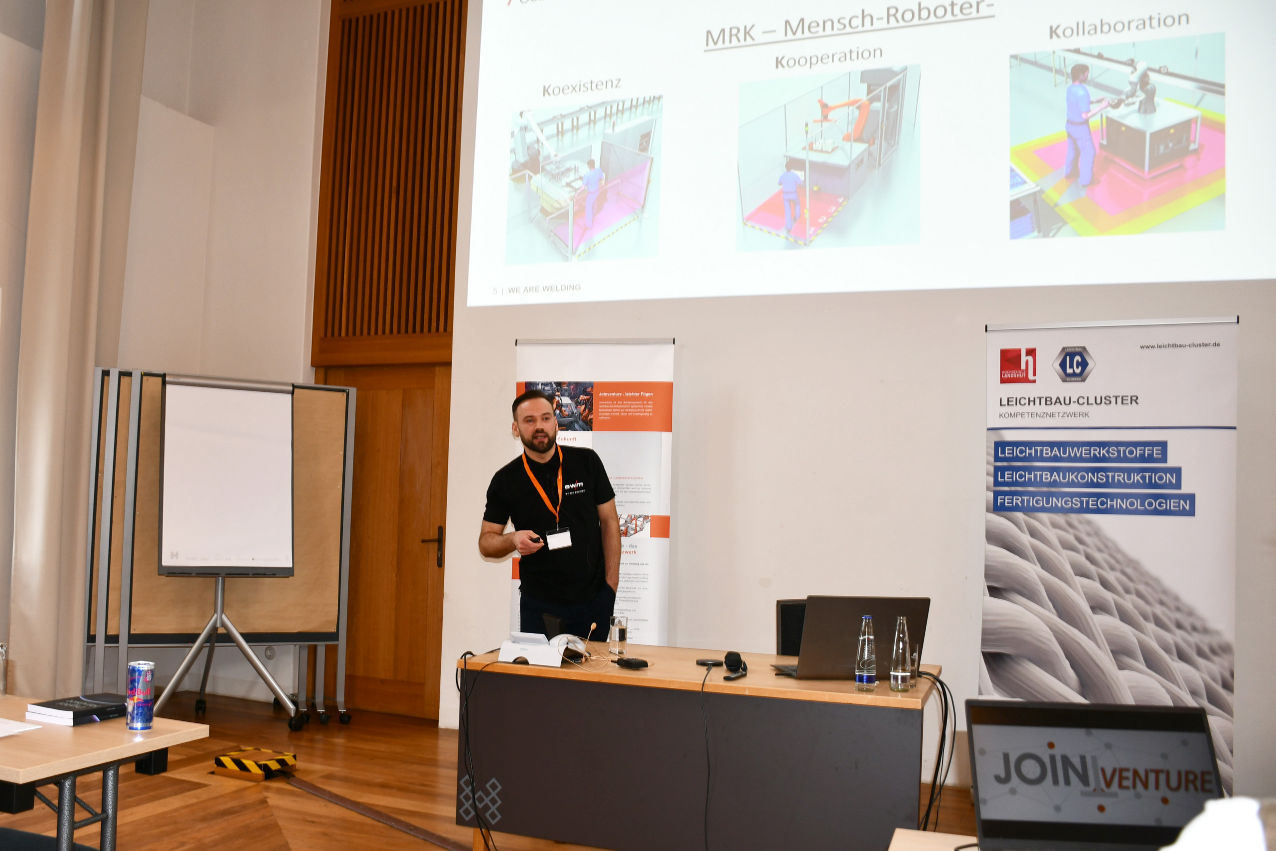 Dimitij Feller presented the current developments of cobots at EWM GmbH. Landshut University of Applied Sciences