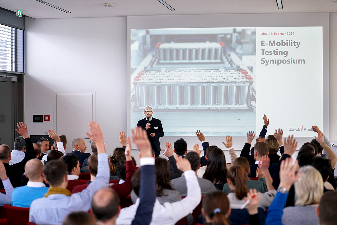 Dr. Simon Vitzthum, Global Industry Manager Mobility (center) opens the E-Mobility Testing Symposium at ZwickRoell, which included the opening of the battery testing laboratory. ZwickRoell GmbH & Co KG
