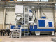 The roller conveyor blast machine painted in Schottel's colors enables repeatable quality in production. © Schottel