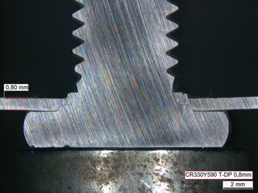 Cross-sectional view of a functional example: a press-fit screw shaft pressed together with metal sheets. © Arnold Umformtechnik